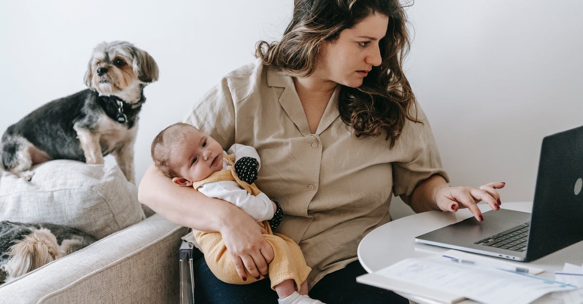 Carrying my laptop to abroad from India - Mother Carrying Her Baby while Working From Home