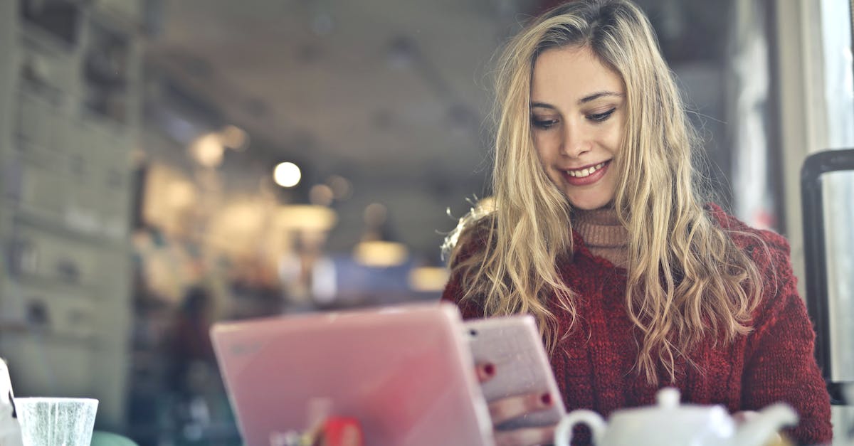 Casual restaurant recommendations in Buenos Aires [closed] - Woman in Red Sweater Holding White Cellphone