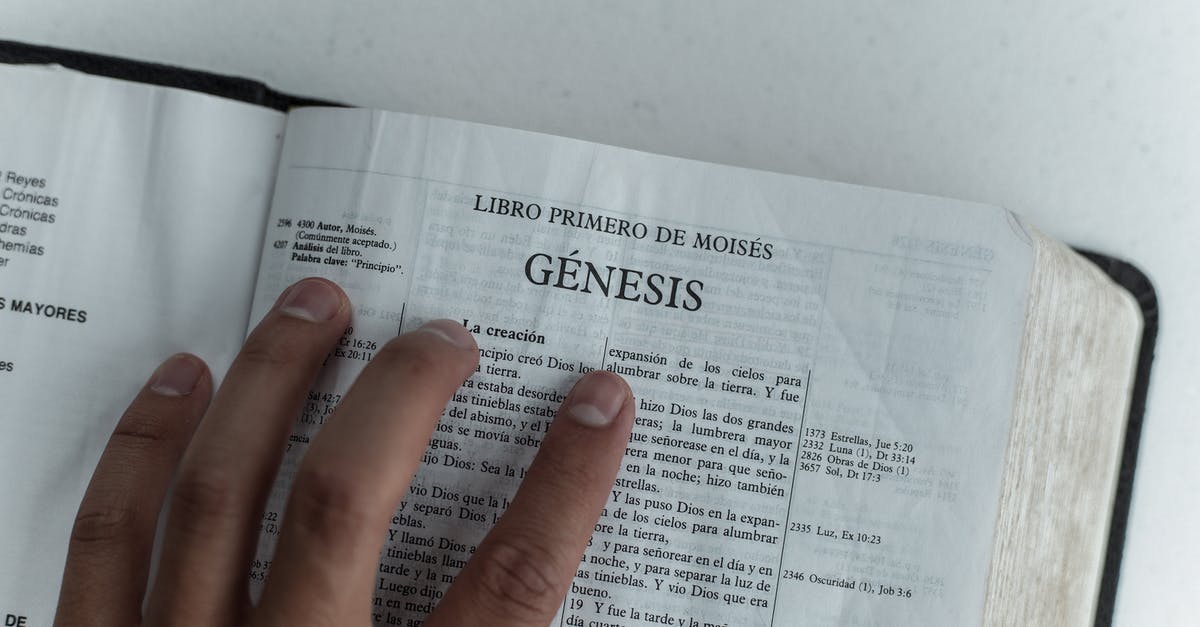 Catalan or Spanish in Barcelona? - Photo of Person Holding a Bible