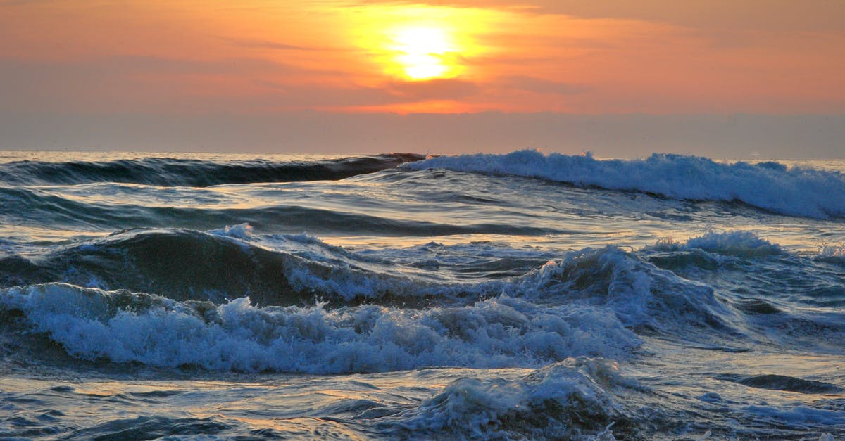 Cathay Pacific overnight layover - Ocean Water during Yellow Sunset