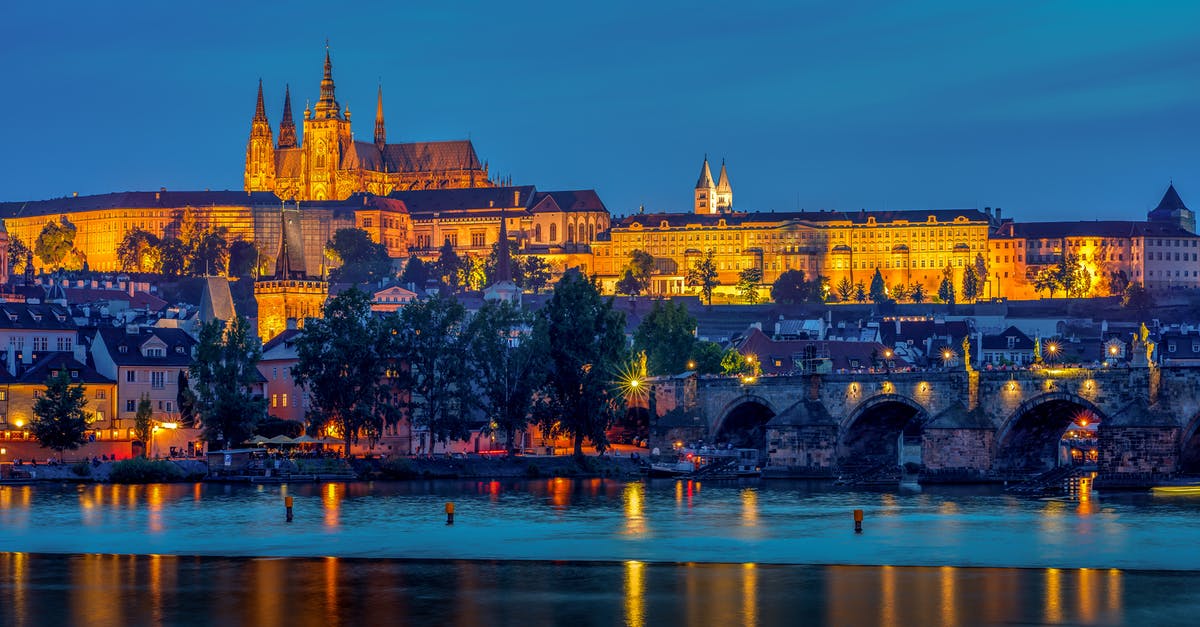 Caught in Czech Republic for travelling with invalid ticket - Reflection Of Illuminated Lights Of Prague Castle On The Lake