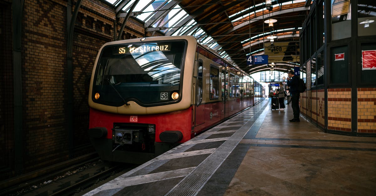 CDG to Bordeaux train options - Red and Black Train in Train Station