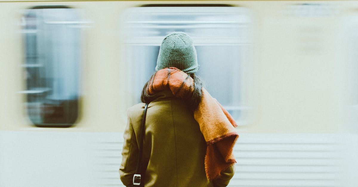 Change in travel dates while waiting for Schengen Visa result - Time-Lapse Photography of Person Standing Near Train