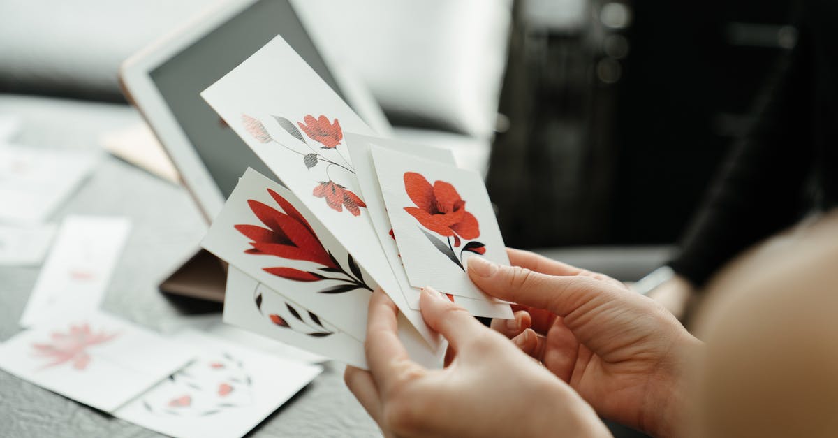 Change of flying dates while visa application is under process - Person Holding White and Red Flower Card