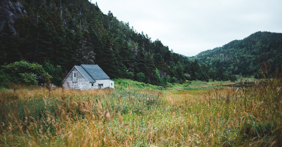 Change the country of interview - A Barn on Green Grass Field