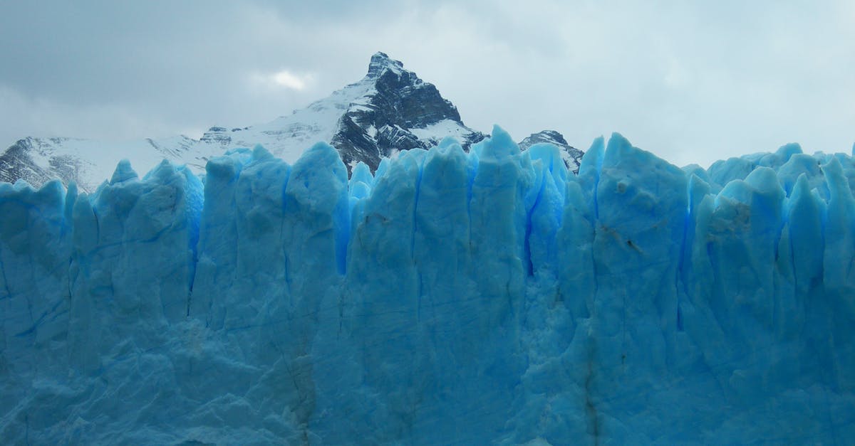 Changing currencies vs withdrawing at ATMs in Argentina - Breathtaking Huge Ice Blue Wall of Perito Moreno Glacier in Patagonia, Argentina