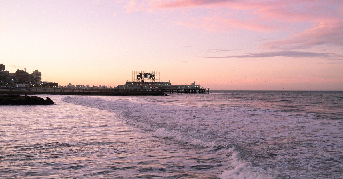 Changing currencies vs withdrawing at ATMs in Argentina - Free stock photo of argentina, mar del plata, sunset