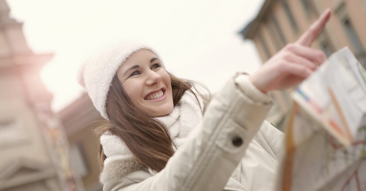 Cheap and convenient way to travel with kids around US - Happy lady finding right direction