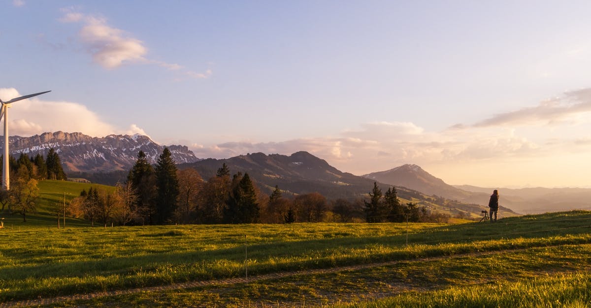 Cheaper alternatives to travel to Hokkaido? - White Wind Mill Near Pine Trees