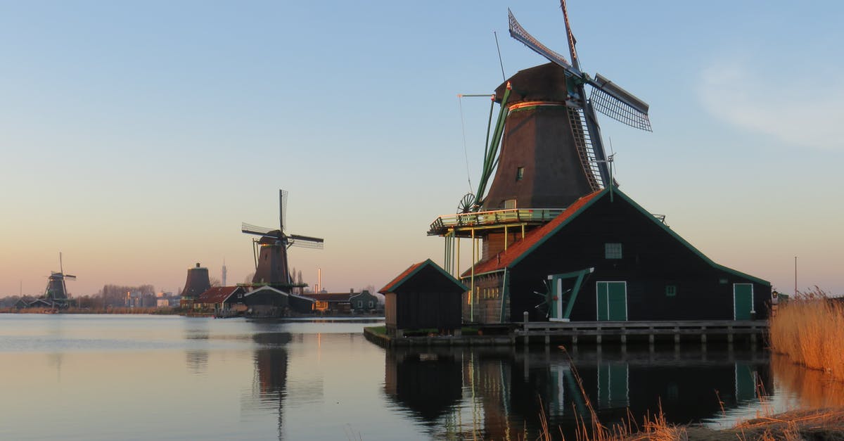 Cheaper alternatives to travel to Hokkaido? - Brown and Black Windmill Beside Body of Water