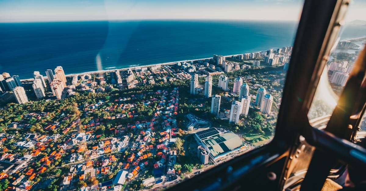 Cheapest flight "from any city" - High-Angle Photo of City Buildings