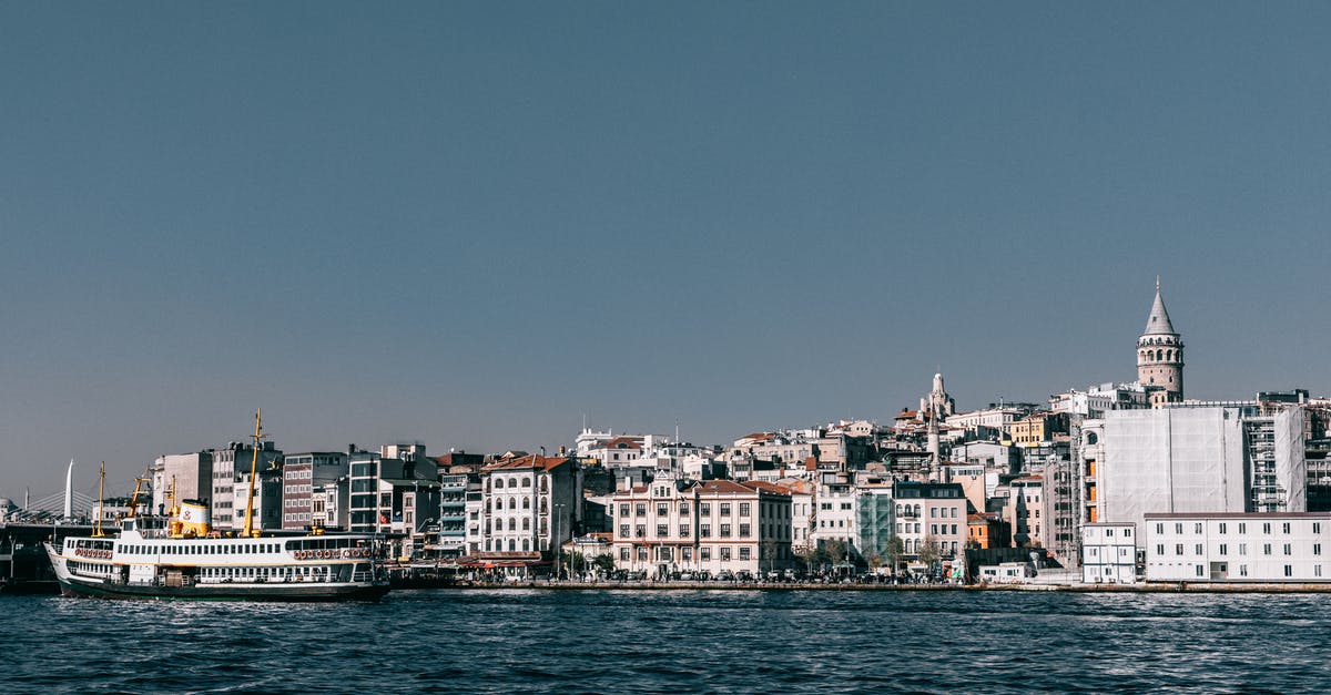 Cheapest transport to go to Istanbul from Van(Turkey) - Ship floating in sea near coastal city