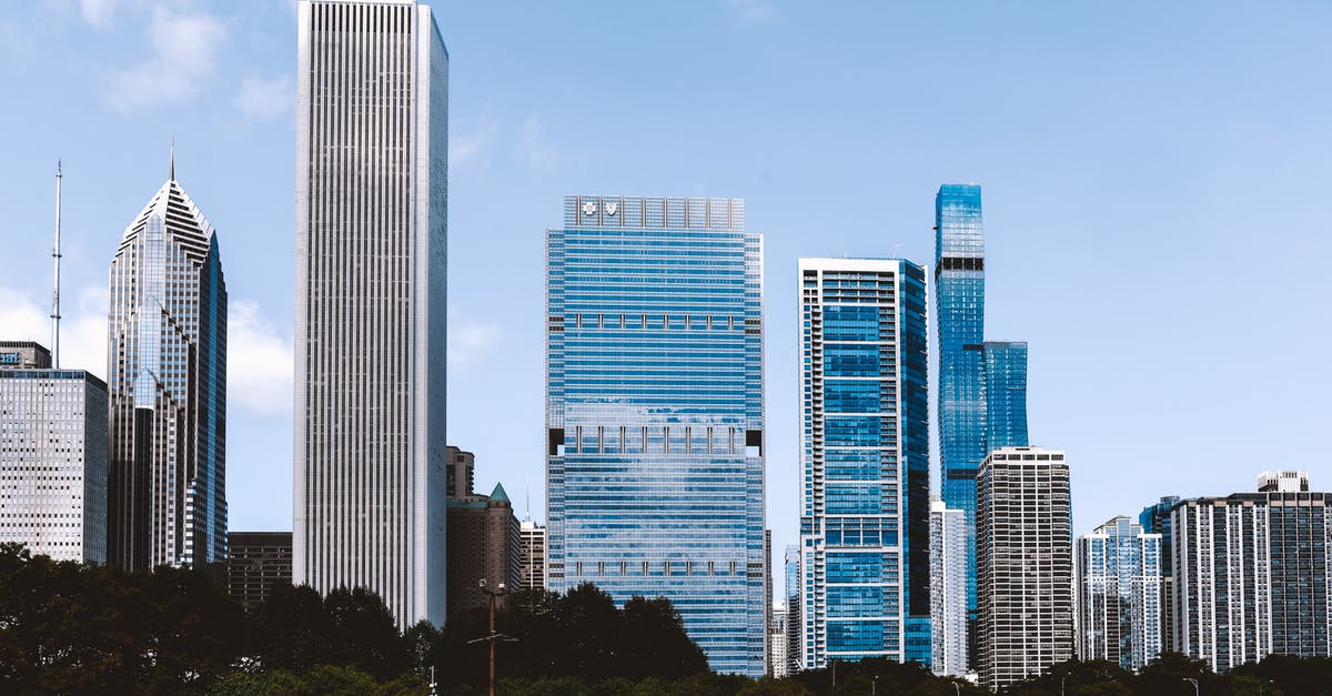 Chicago United Center to Midway Airport - Contemporary megapolis architecture against cloudless sky