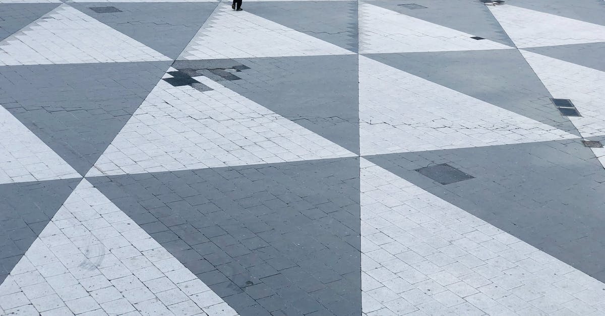 Chile to Sweden without a visa - A Person Walking the Pedestrian Plaza of Sergels Torg in Norrmalm, Stockholms, Sweden