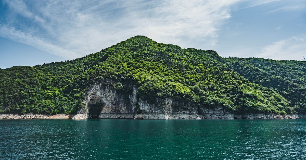 China to Cayman Islands via Miami [closed] - Landscape Photo of Mountain Covered With Trees