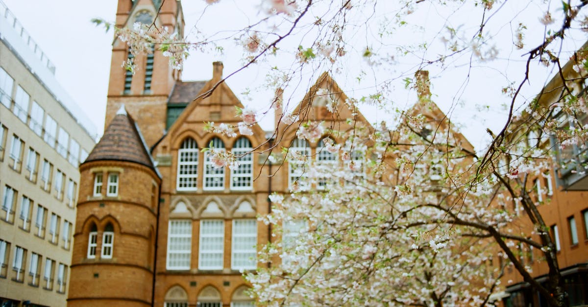 Chinese national with UK permanent residency requires visa to travel to Ireland? - Exterior of historic building with clock on spire in Birmingham on clear spring day Chinese national with UK permanent residency requires visa to travel to Ireland? - Exterior of historic building with clock on spire in Birmingham on clear spring day