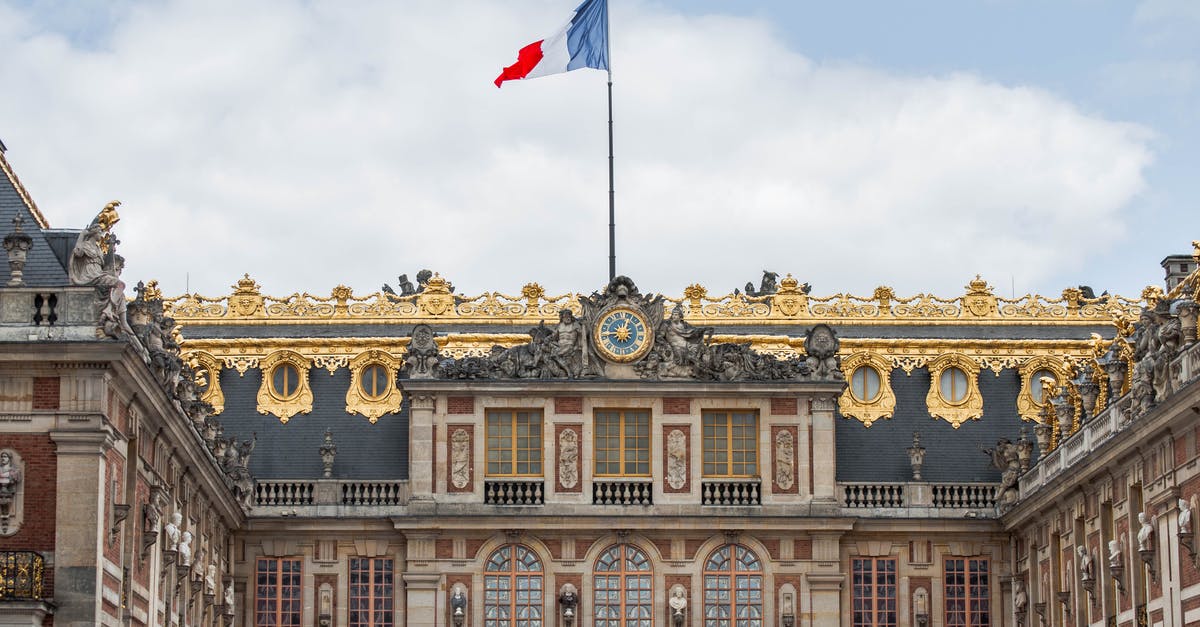 Citizens Advice Bureau France - Concrete Building With Flag