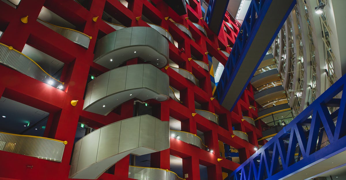 Claiming on registered international mail in Japan - Low angle of balconies and passages on modern Asia and Pacific Trade Center in Osaka