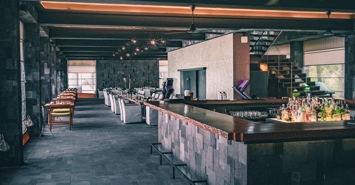 Classic Aussie pub (hotel) in central Sydney - Modern interior of restaurant in dark tones