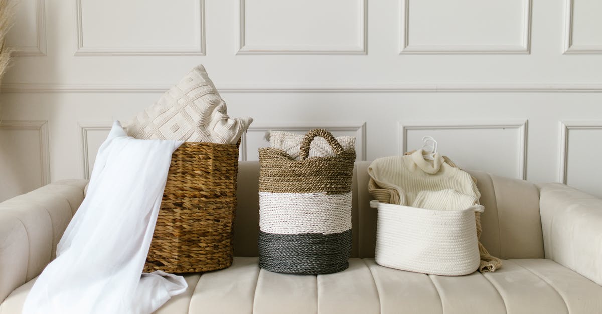 Clothing in Jordan - White and Brown Wicker Baskets on White Couch