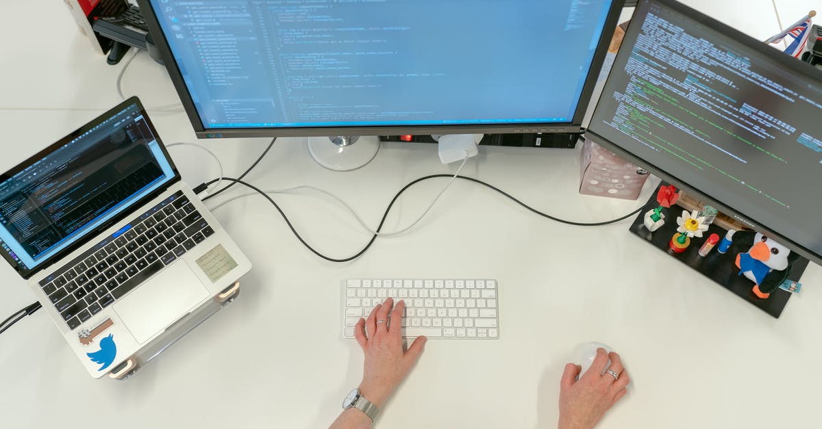 Code shared flights after BA / Aer Lingus merger - Female Software Engineer Coding on Computer