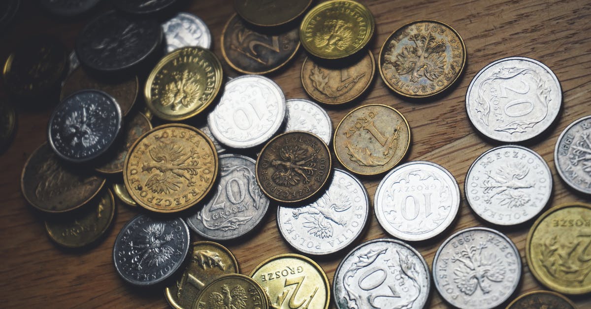 Collecting euro coins of European microstates [closed] - Close-up of Coins on Table