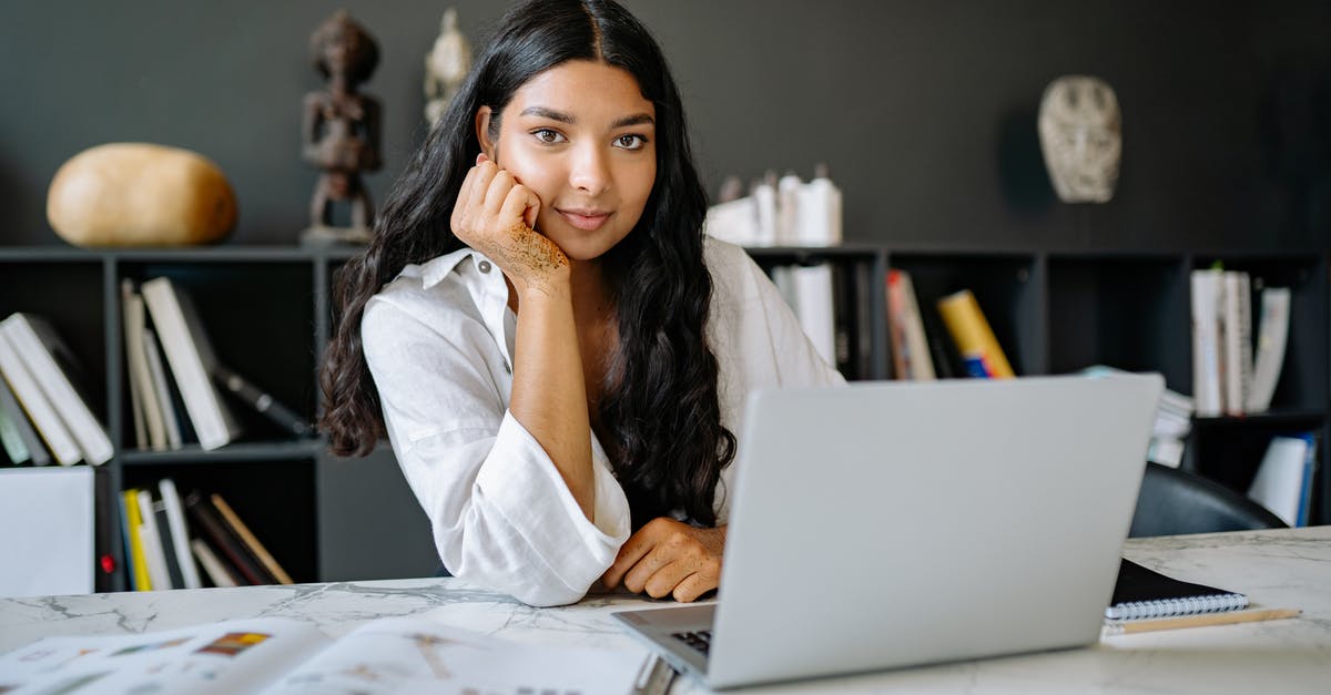 Compilation of Documents for Temporary Residence Visa [closed] - Woman in White Long Sleeve Shirt Using Macbook Air