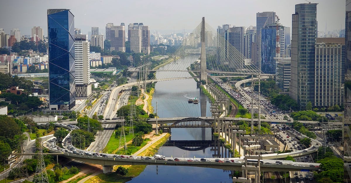 Concentrated area of sight seeing opportunities in Bangkok, Thailand? - Amazing view of modern urban district in Sao Paolo with futuristic bridge and constructions over river during clear day