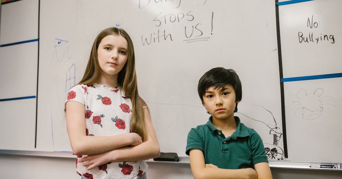 Confused over 6-month Canadian eTA vs 3-month US ESTA - Two Kids Standing by the White Board