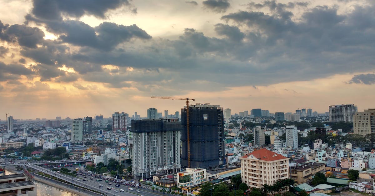 Connecting flights at Ho Chi Minh airport Vietnam - City Buildings Under Cloudy Sky