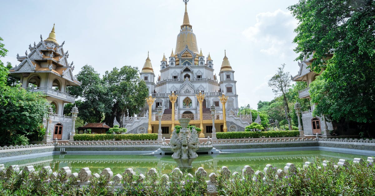 Connecting flights at Ho Chi Minh airport Vietnam -  Buu Long Buddhist Temple under White Sky