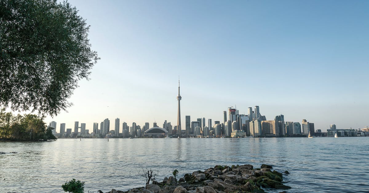 Connecting through Toronto on separate tickets - City Skyline Across Body of Water