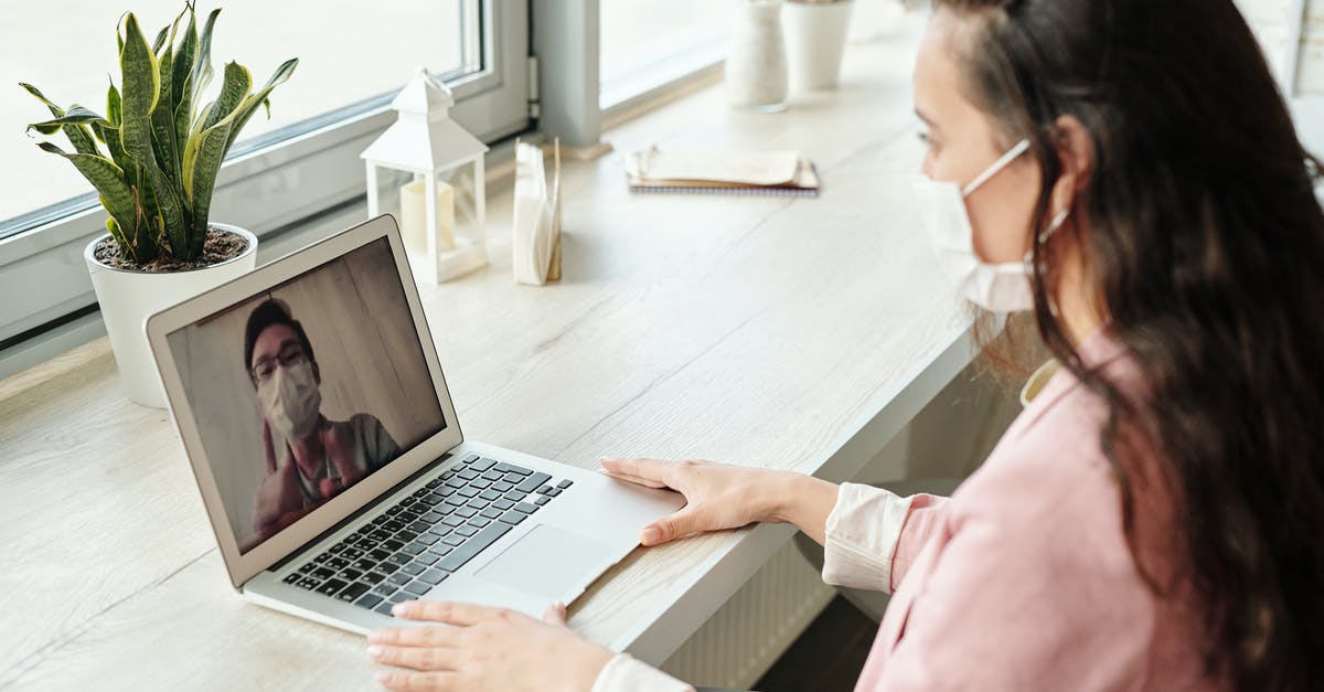 Connecting time minimum Newark International - Woman Having A Video Call