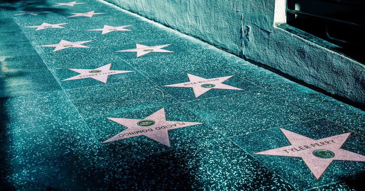 Converting patronymic names to surnames - Pink Stars on Gray Tiled Street Sidewalk 