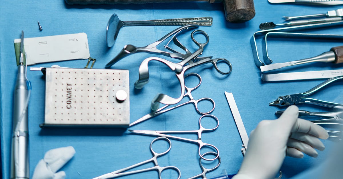 Cosmetic/Dental Surgery in Thailand - Resources? [closed] - Gray Metal Tool on White Table