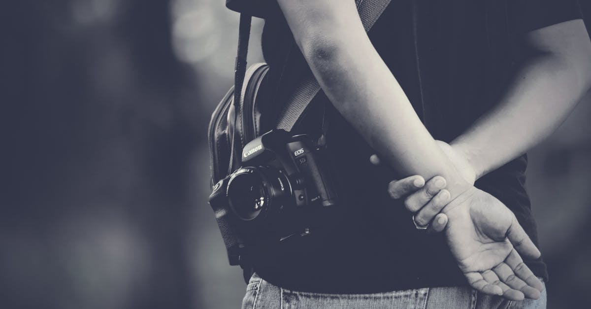 Costa Rican health insurance and tourist visa length - Grayscale Photography of Man Wearing Camera