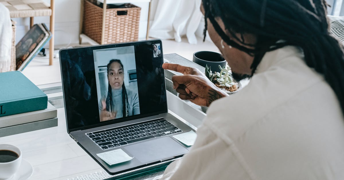 Could I use American Express rewards points for Eurostar - Stressed black couple having video call via laptop