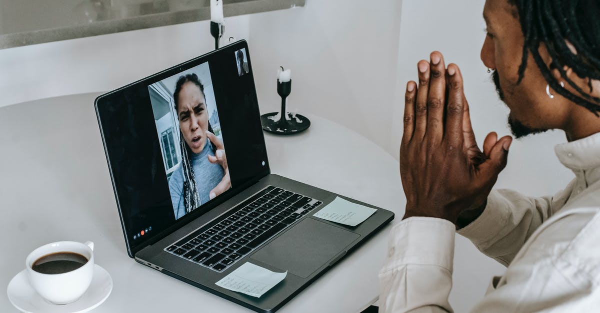 Could I use American Express rewards points for Eurostar - Anxious misunderstanding African American couple having video call via laptop and arguing emotionally while going through relationships crisis