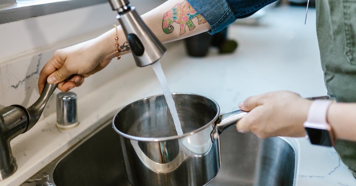 Countries with drinkable tap water? [closed] - Close up of Pouring Tap Water to Pot