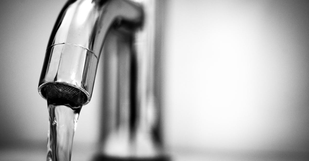 Countries with drinkable tap water? [closed] - Macro Photography of a Stainless Steel Faucet 