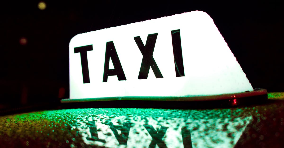 Croatia - Pula/Porec taxi prices - Wet Taxi Roof Light During Night Time
