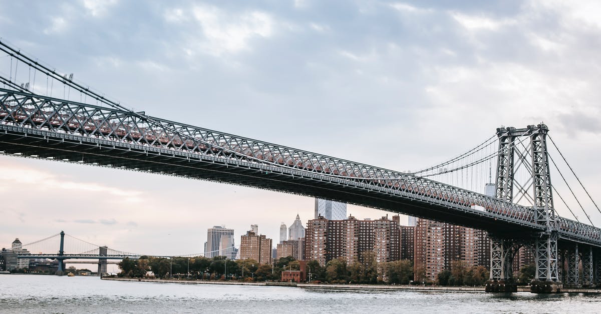 Cross US border with two laptops - Modern suspension bridge in urban city