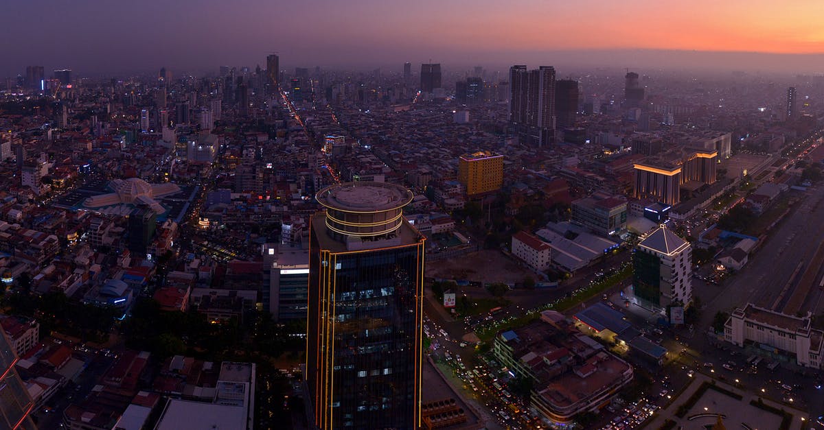 Crossing border from Phnom Penh, Cambodia to Tay Ninh, Vietnam - Aerial View Of City Buildings 