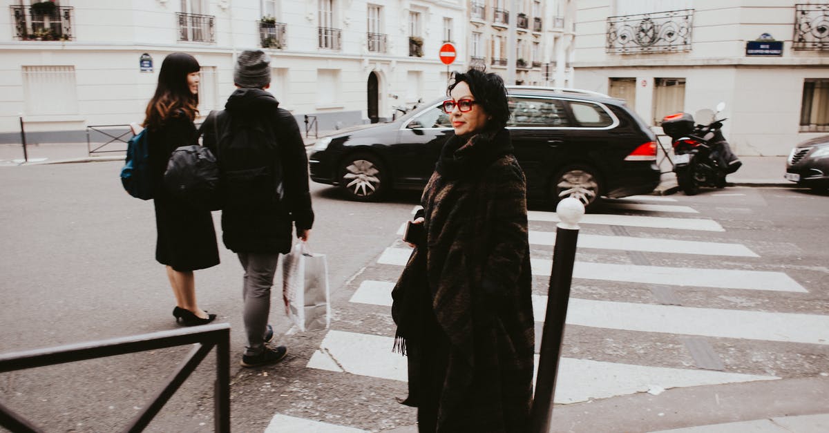 Crossing from UK to France and back on the same day in the same car but with different drivers - Three People Crossing Pedestrian Lane Crossing from UK to France and back on the same day in the same car but with different drivers - Three People Crossing Pedestrian Lane