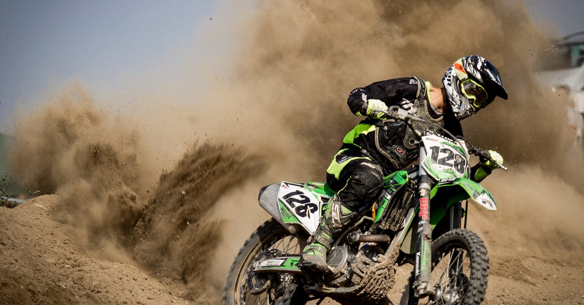 Crossing Hungarian-Serbian border with Dutch driving licence - Rider Riding Green Motocross Dirt Bike