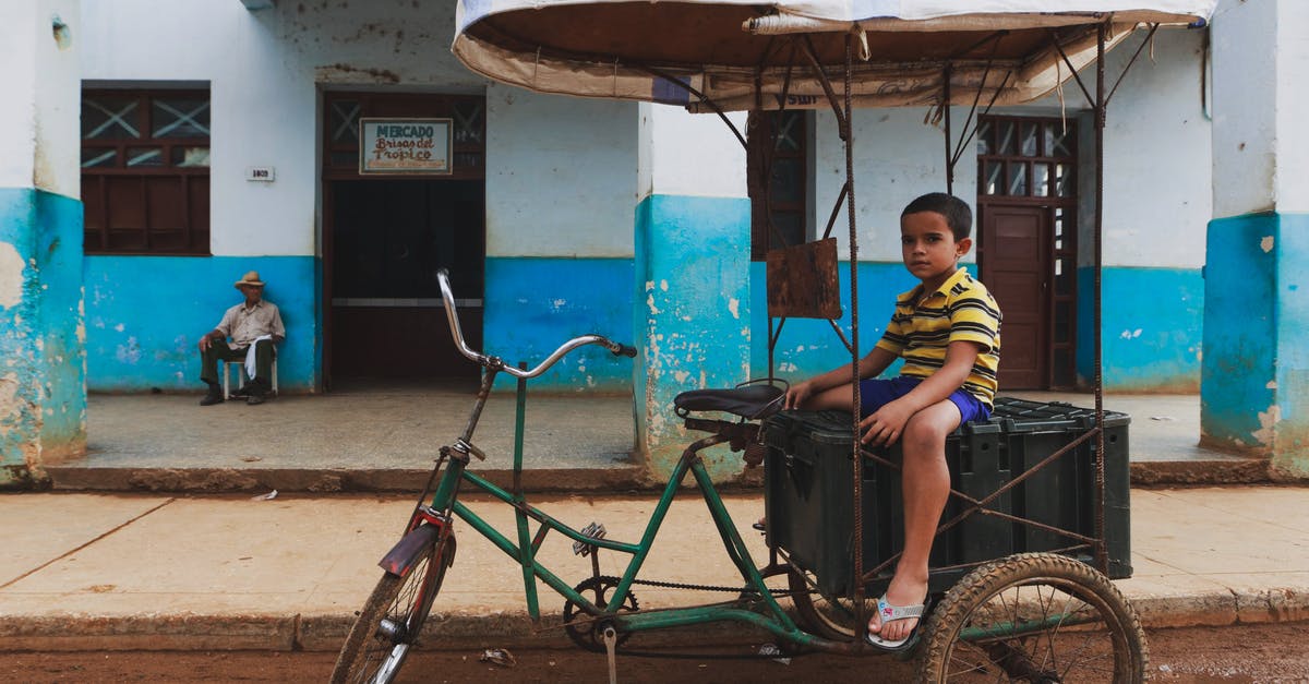 Cuba 'taxi colectivo' - availability and prices? - Little Boy Sitting on Cuban Rickshaw Taxi 