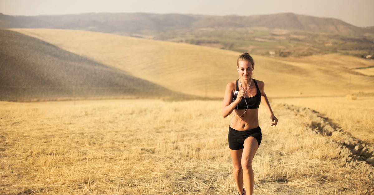 Day 2 vs. Fit to Fly tests UK - Happy young woman running in field