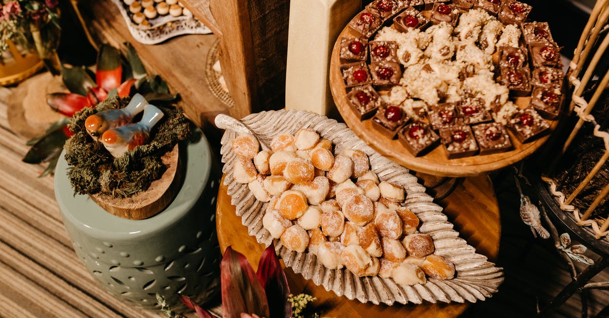 Delicacies of Emilia-Romagna region [closed] - Cookies and delicacies presented on wooden plates