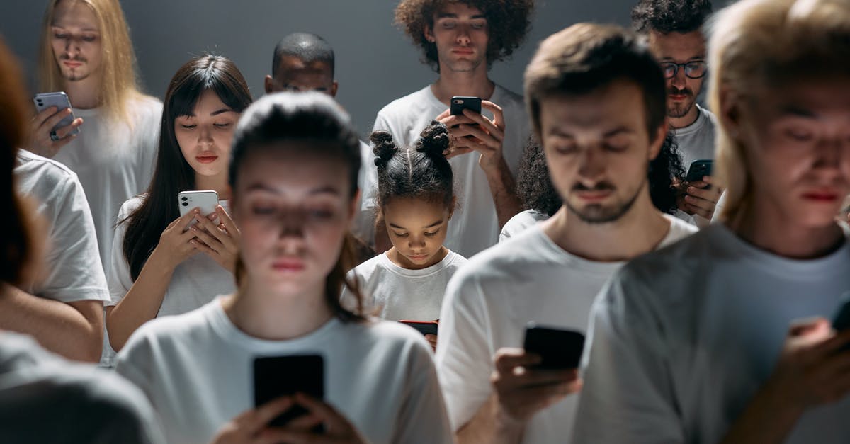 Detached Passport [duplicate] - Photo of People Engaged on their Phones