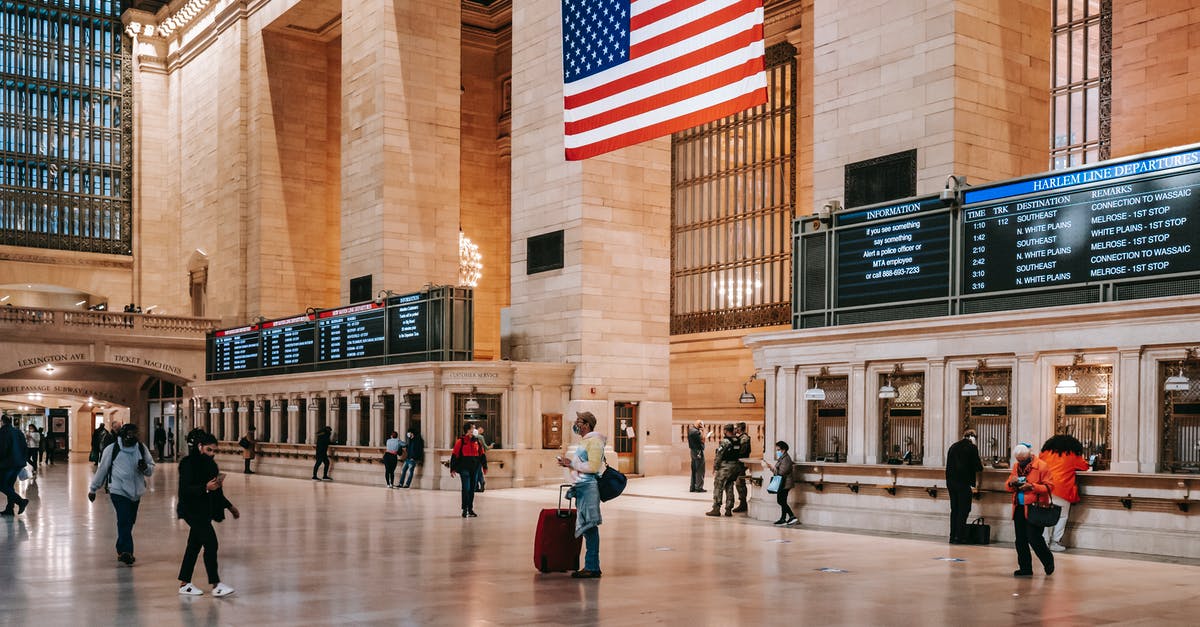 Detailed timetable for the Qinghai-Tibet Railway - Interior of classic Grand Central Terminal building with brick columns and ornamental walls over parquet on floor